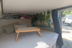 Inside: Bed with bed-desk